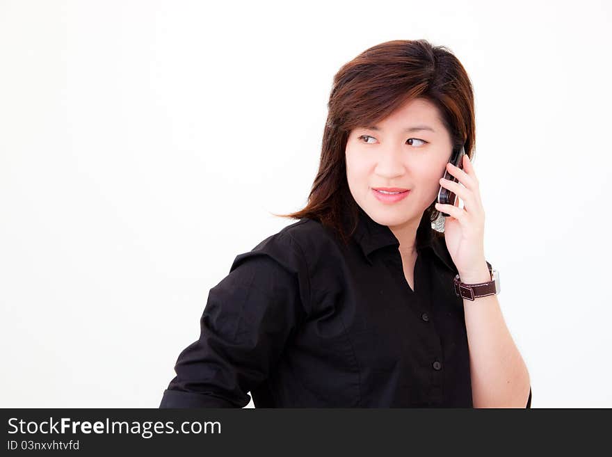 Asian woman in black shirt with telephone