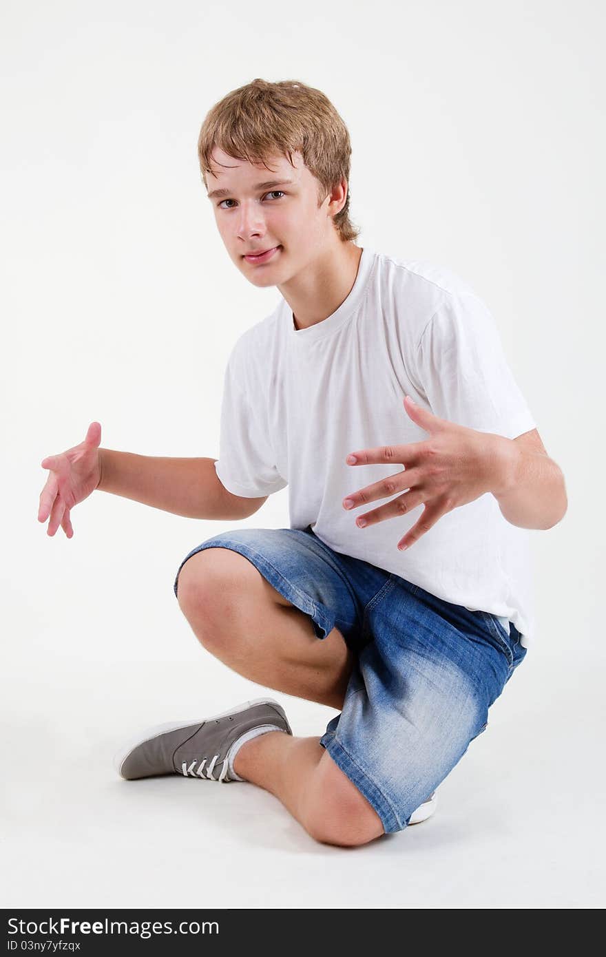 Smiling Teen B-boy Posing On White