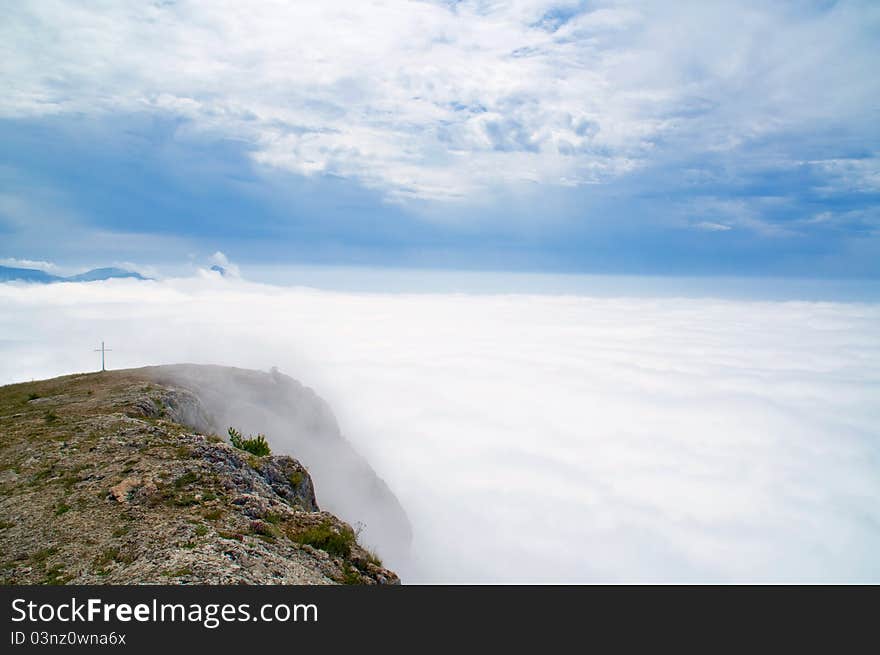 Mountain peaks towering above the clouds