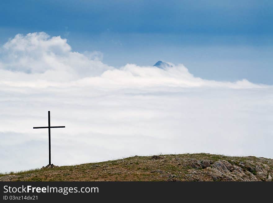 Mountain peaks towering above the clouds