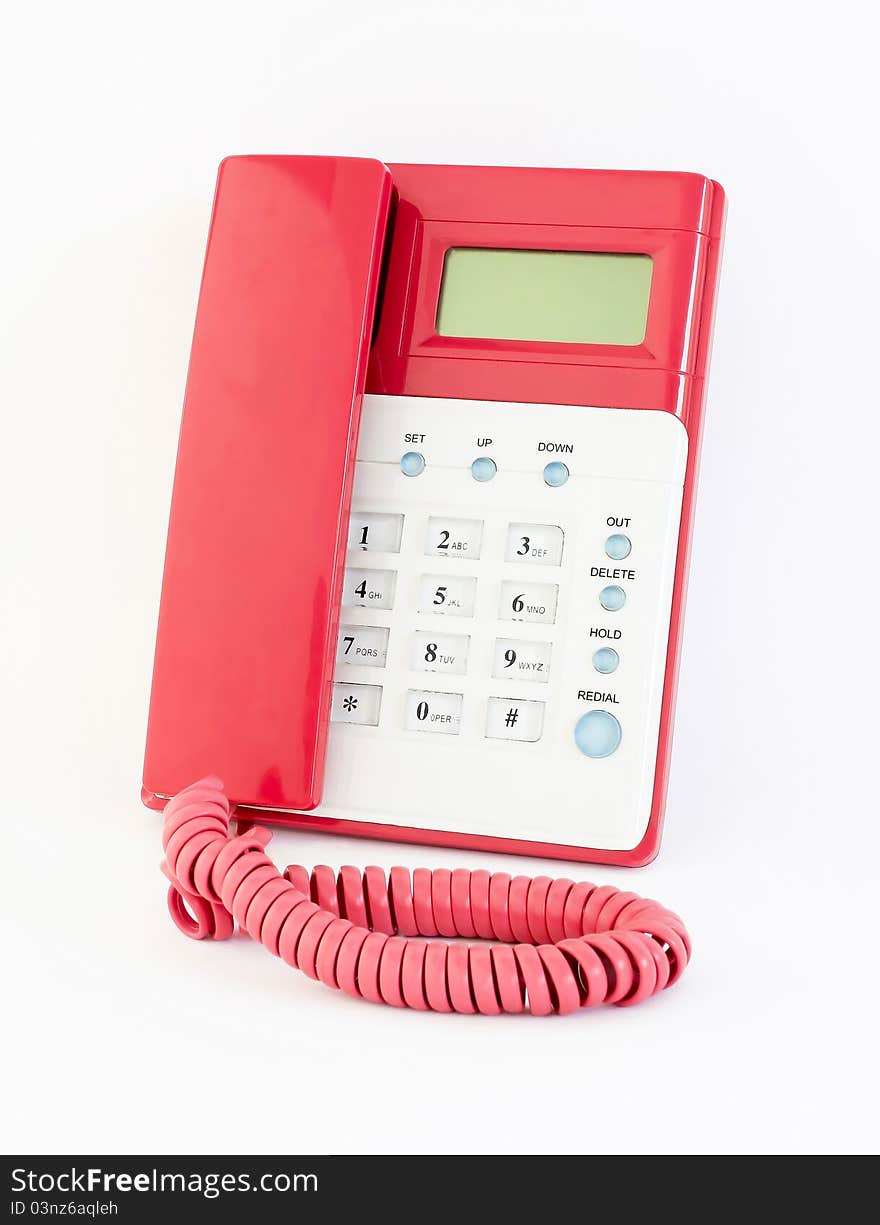 The pink telephone on a white background