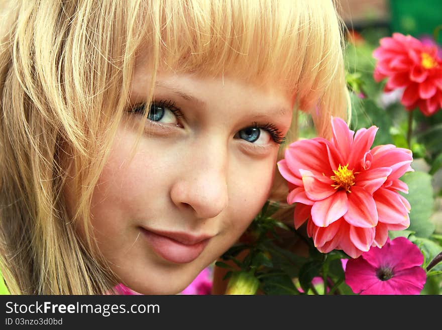 Beautiful girl face is smliling with flowers. Beautiful girl face is smliling with flowers