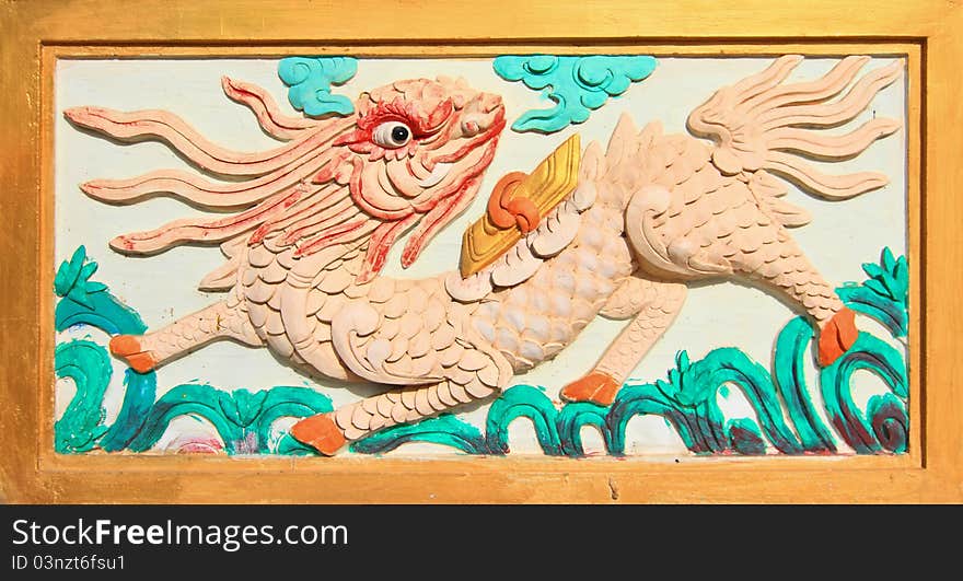 Chinese style dragon decorating on the temple wall