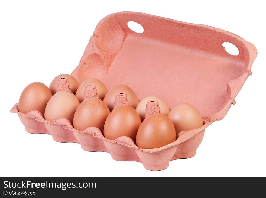 Chicken eggs in carton box isolated on white background shadow below. Chicken eggs in carton box isolated on white background shadow below.