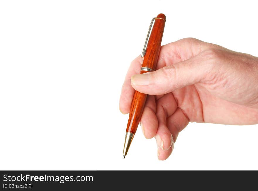 Closeup of a males hand holding a pen isolated against white. Closeup of a males hand holding a pen isolated against white