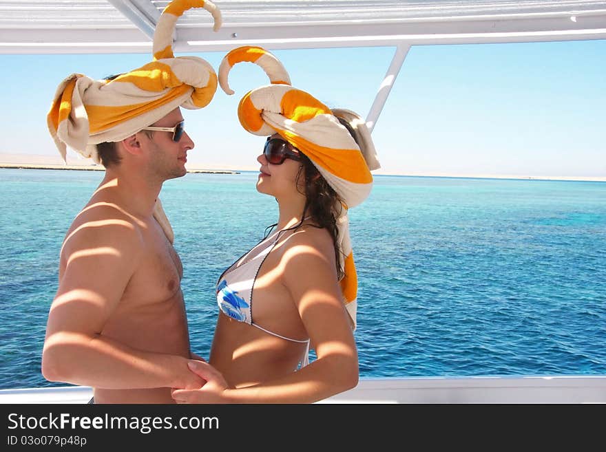 Young happy couple on a boat. Young happy couple on a boat