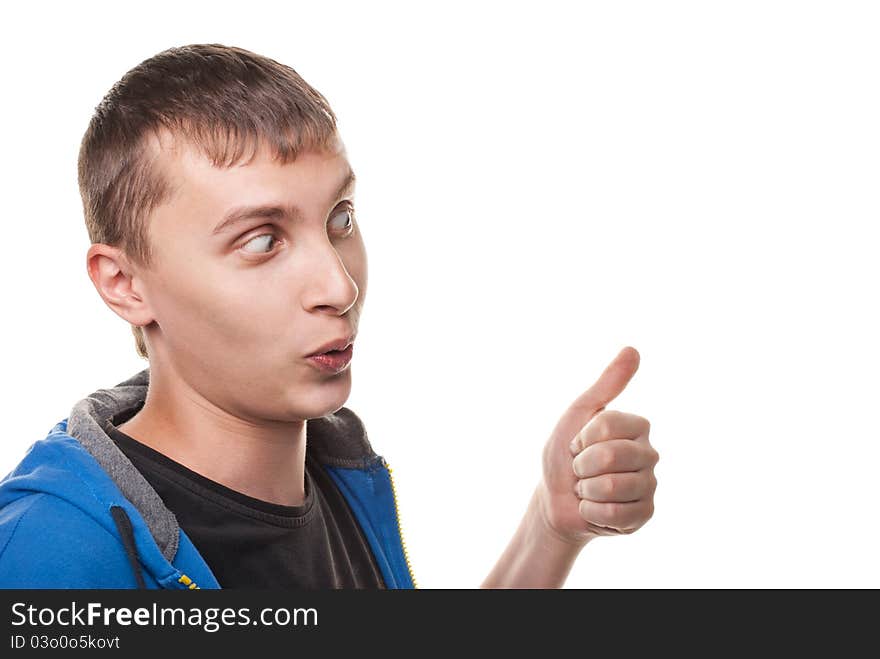 Portrait of a handsome young man, thumbs up over white background