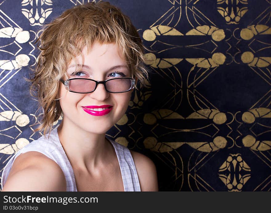 Beautiful smiling woman wearing glasses. Beautiful smiling woman wearing glasses