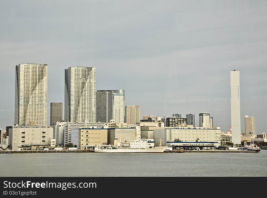 Tokyo city near the sea. View from the harbour to Odiba at Tokyo, Japan