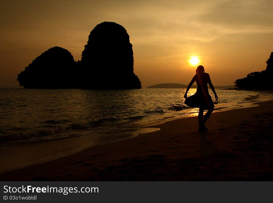 Girl on the Railay beach before sunset. Girl on the Railay beach before sunset