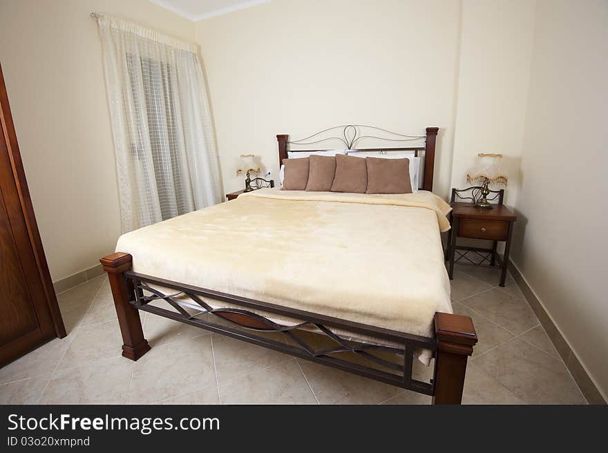 Double bed in a bedroom