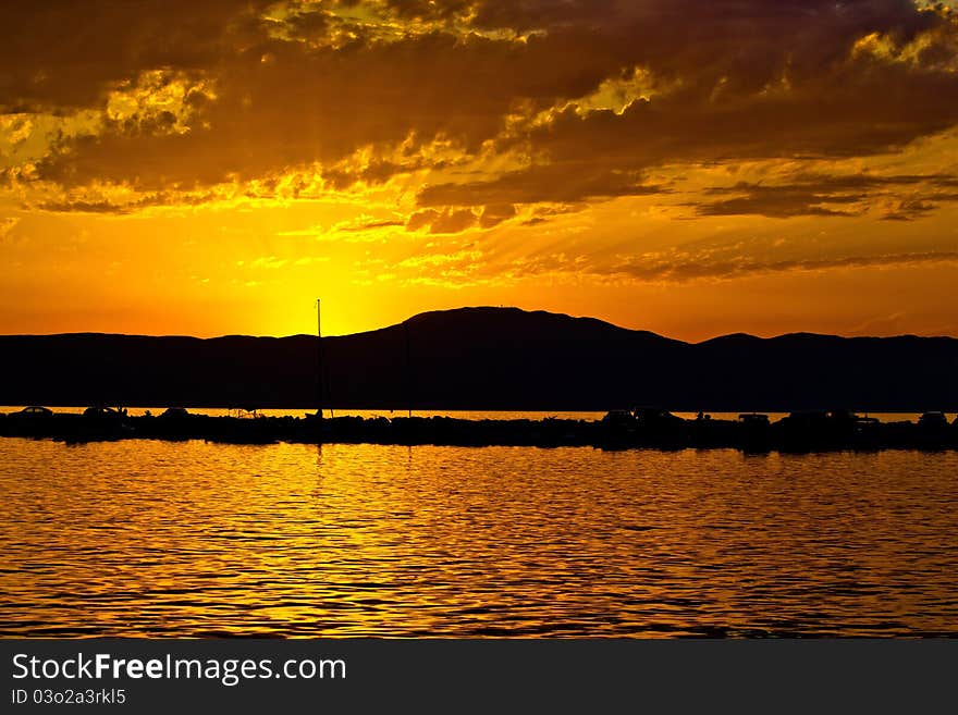 Photo of golden sunset in Malinska, Croatia