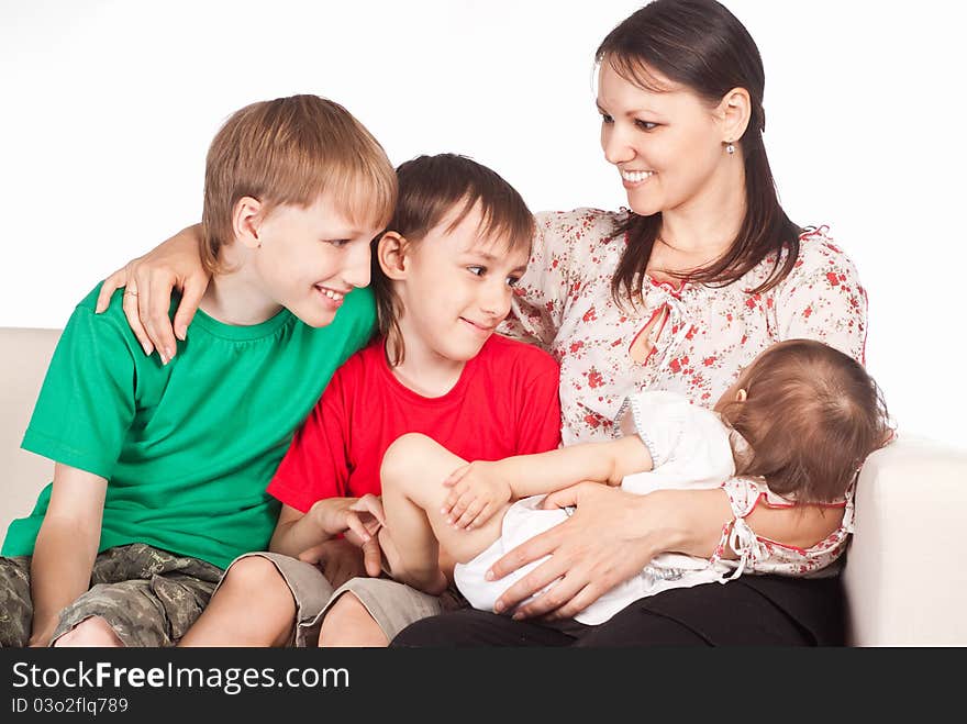 Portrait of a cute family at sofa