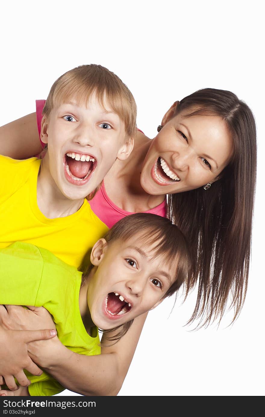 Cute mom with her boys on white. Cute mom with her boys on white