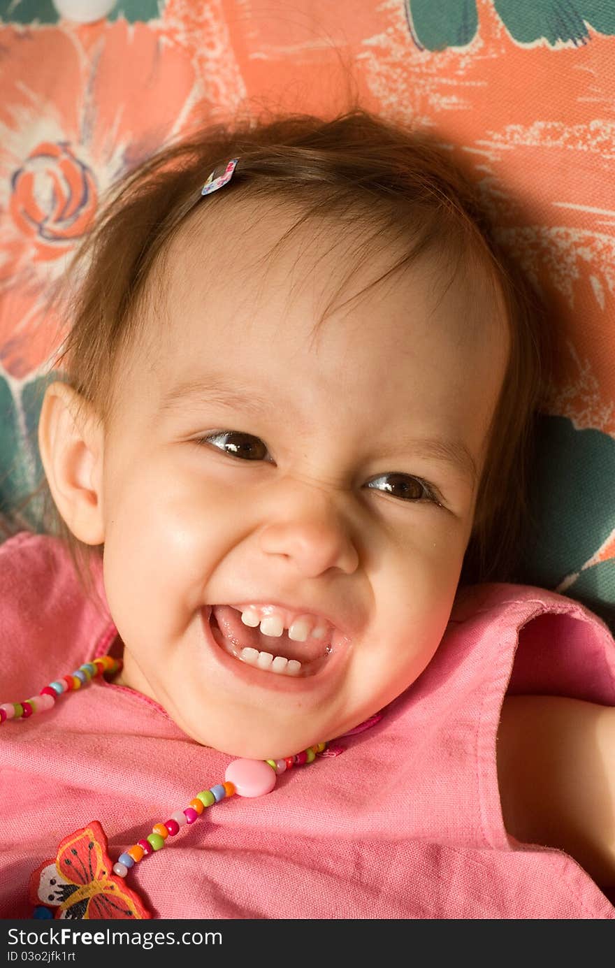 Portrait of a cute little girl in pink clothes. Portrait of a cute little girl in pink clothes