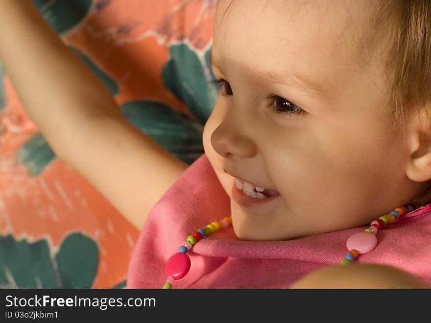 Portrait of a cute little girl in pink clothes. Portrait of a cute little girl in pink clothes