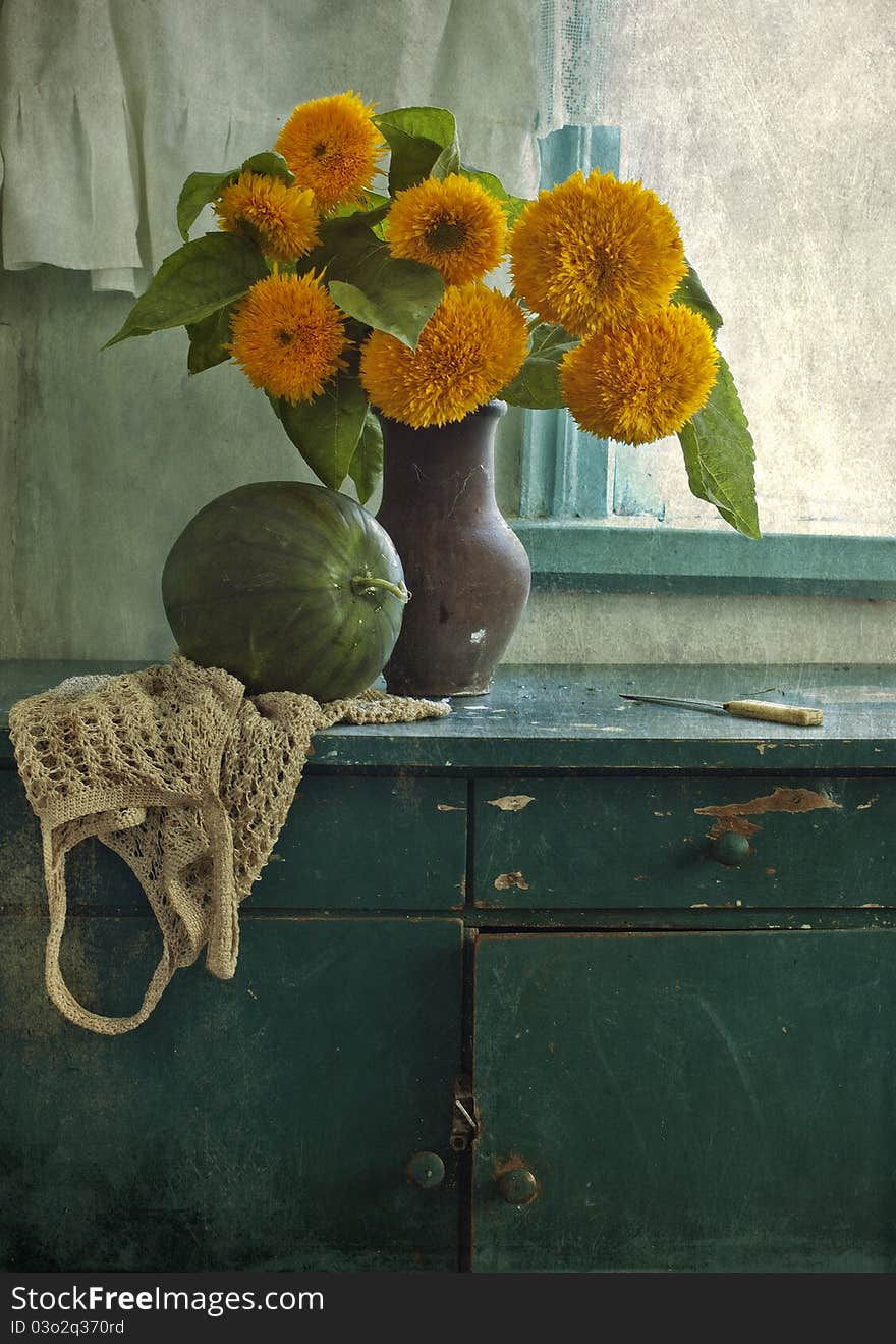 Still life from the bouquet of sunflowers and water-melon