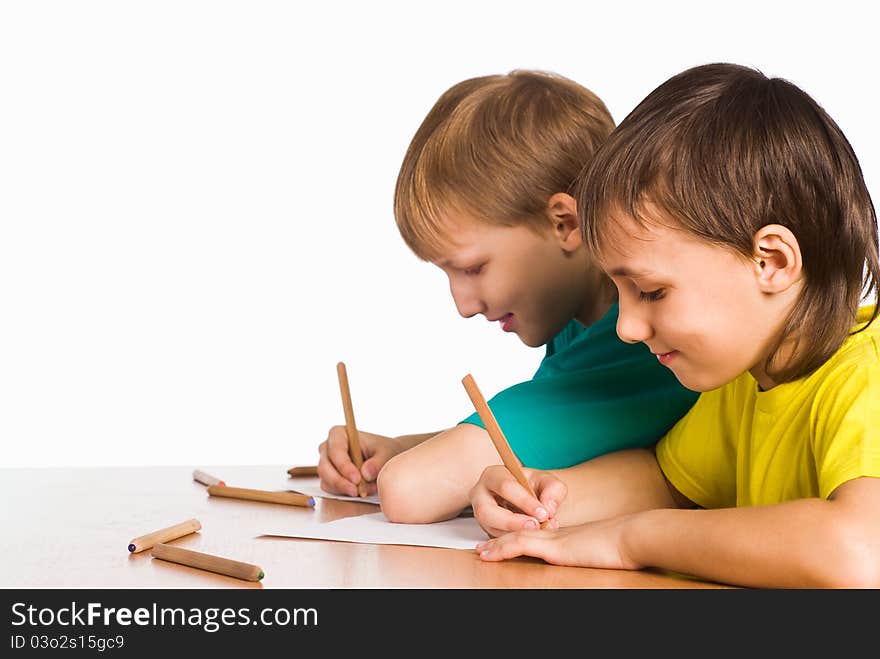 Portrait of a two boys drawing