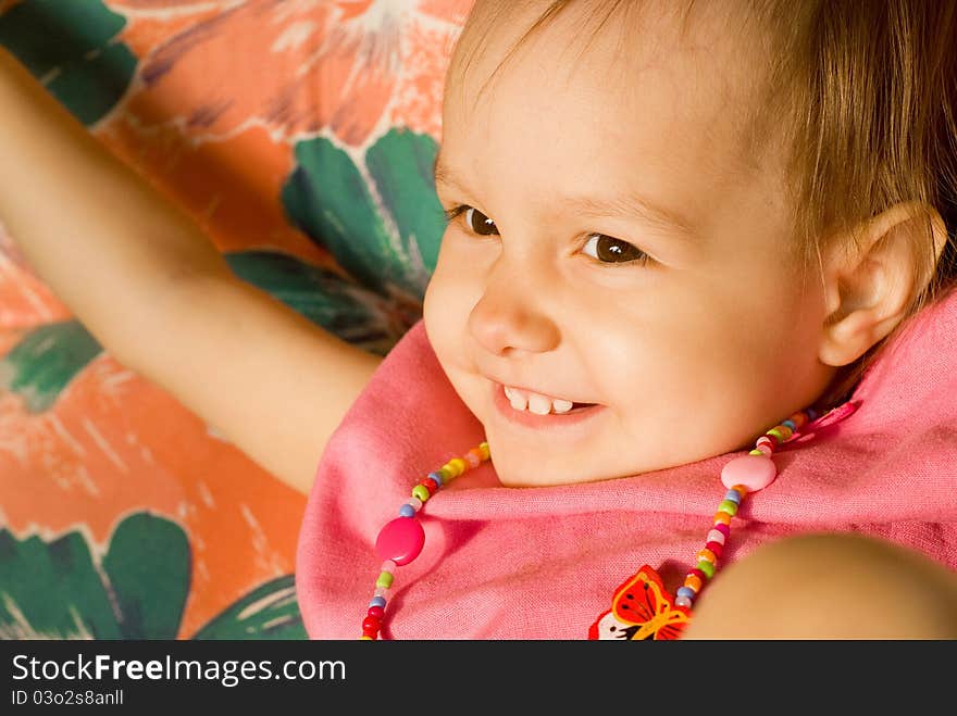 Portrait of a cute little girl in pink clothes. Portrait of a cute little girl in pink clothes