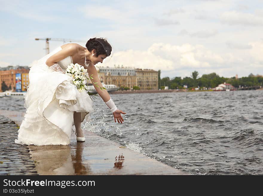 Bride and groom on the background of the temple. Bride and groom on the background of the temple