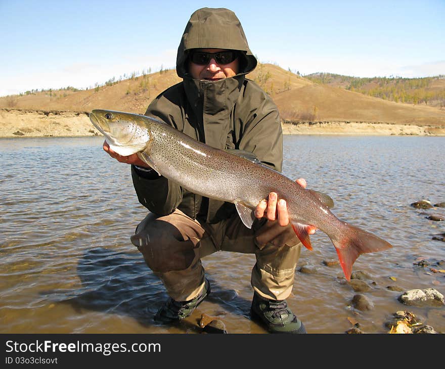 Fishing - fisherman catched big fish