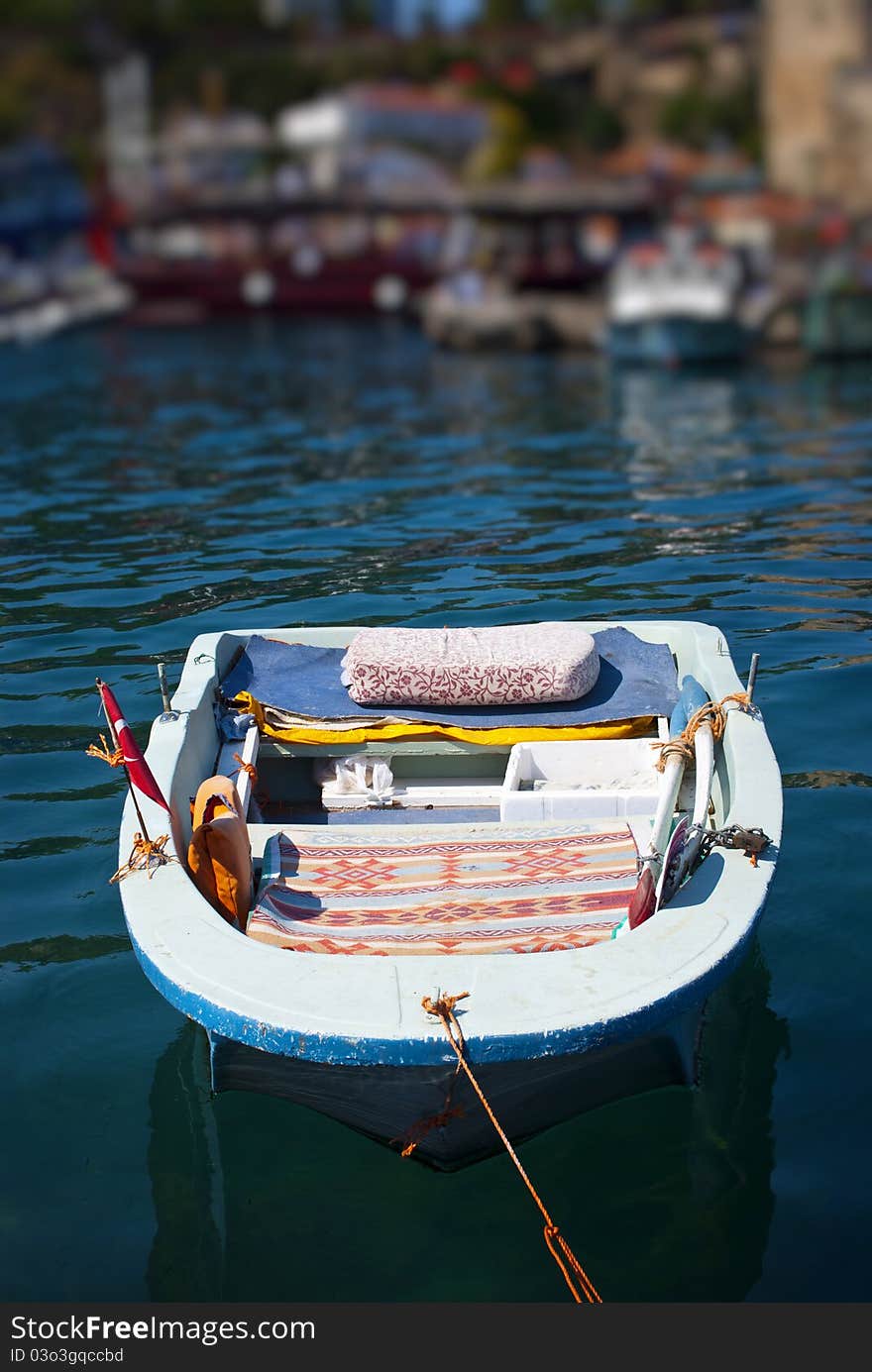 Small boat on the sea waves. Small boat on the sea waves