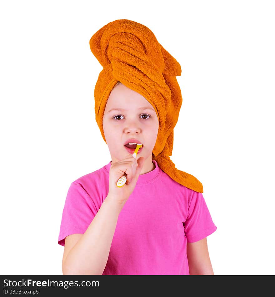 Girl brushing her teeth on a white