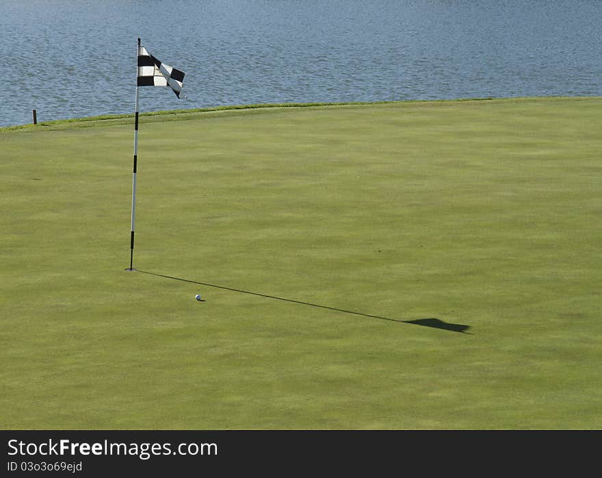 Golf flag in a golf course in South Africa. Golf flag in a golf course in South Africa