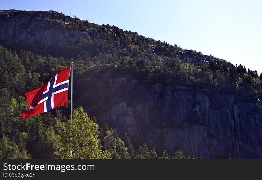 Flag of Norway in front of Mountains