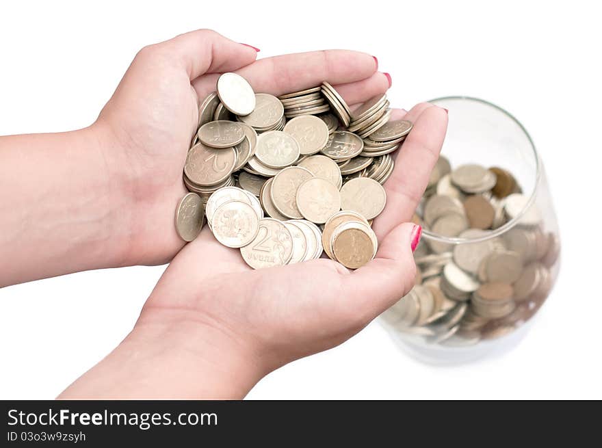 Stack of coins, arms, and a glass