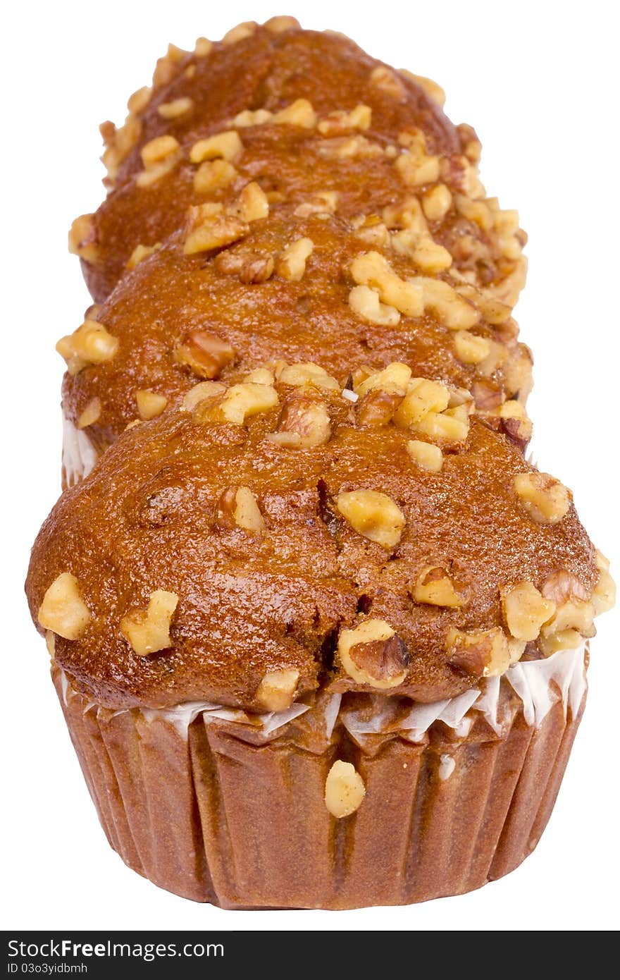 Row of nut muffins on a white background.