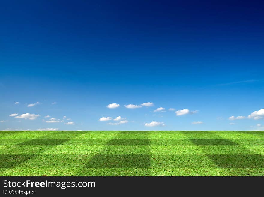 View of Beautiful square tone lawn and the blue sky. View of Beautiful square tone lawn and the blue sky.