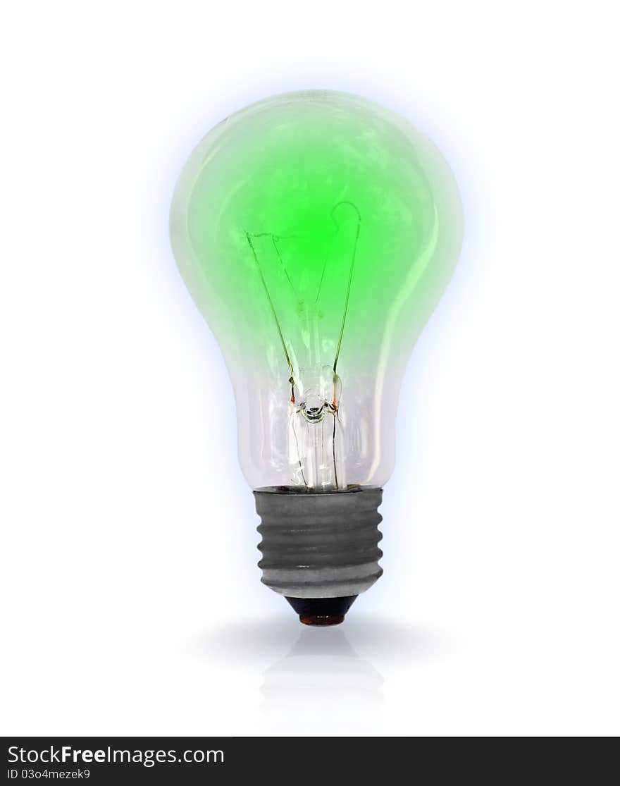 Green light bulb on white background