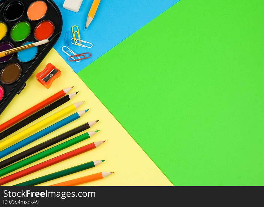 Back to school on colorful paper background