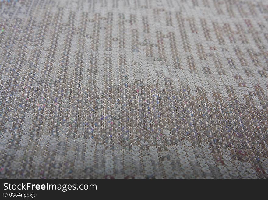 Gray background - material with sequins. Gray background - material with sequins