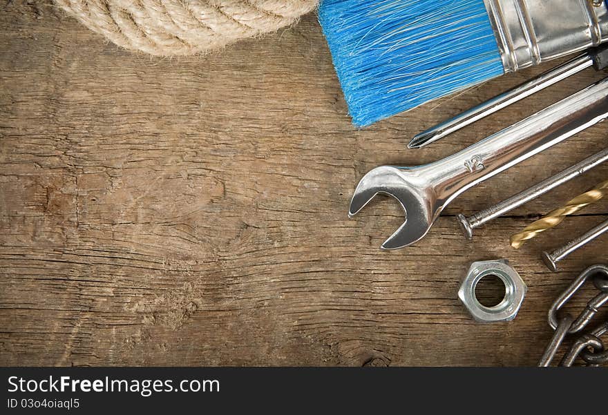 Tools and instruments on wooden texture