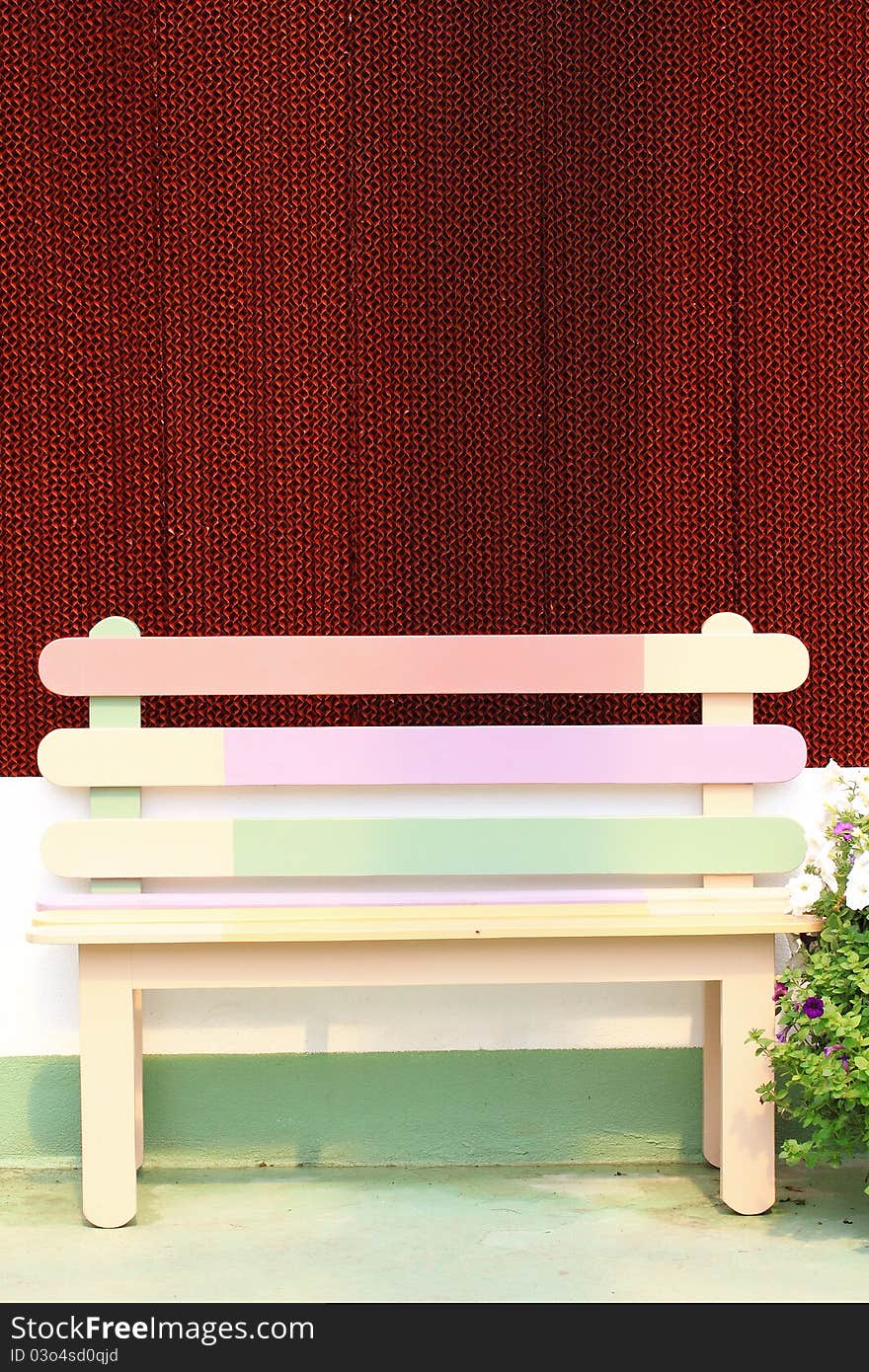 Colorful chair with beautiful red background