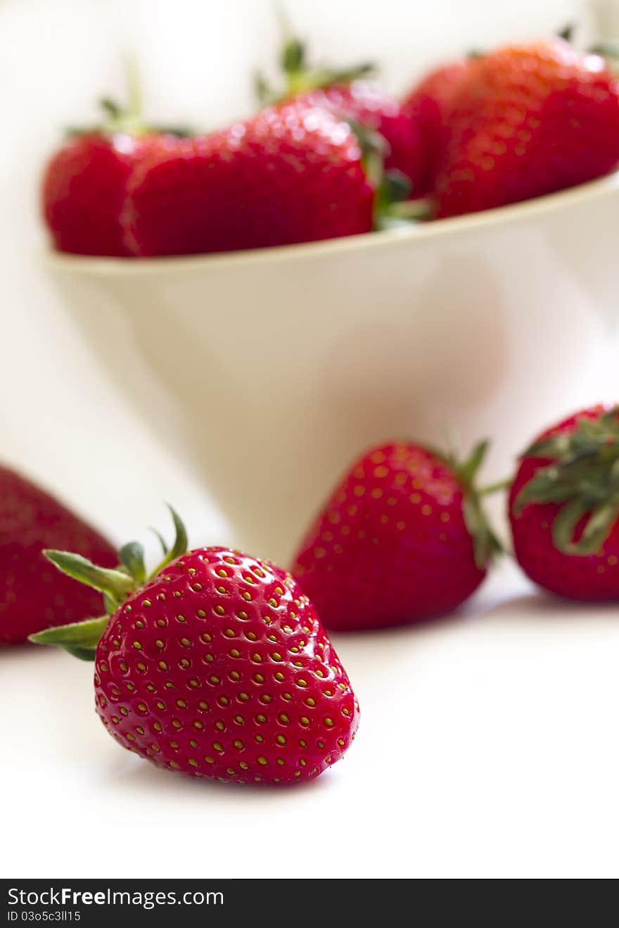 Shallow focus on the one strawberry. Shallow focus on the one strawberry