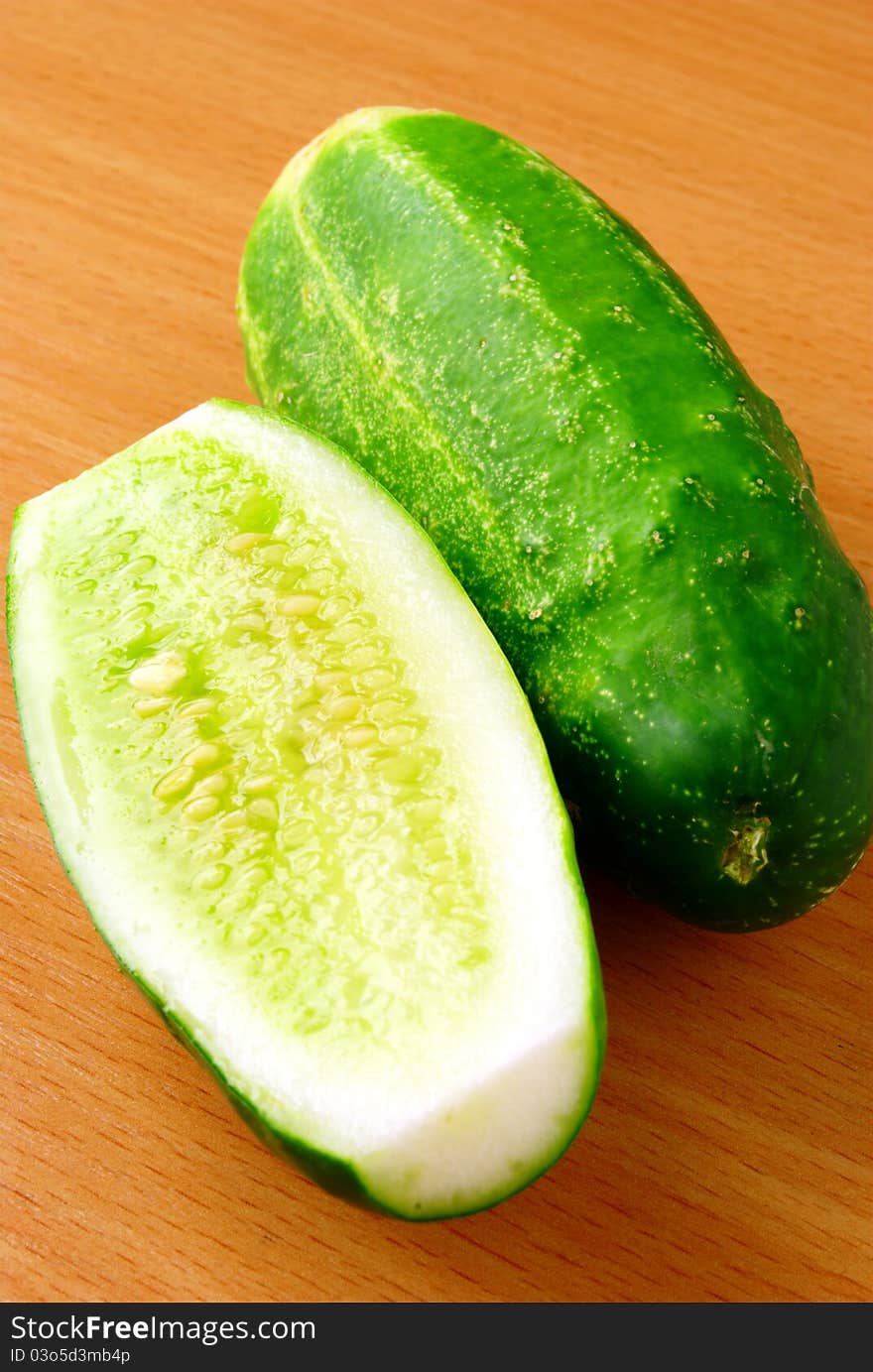 Green cucumber cut into two parts