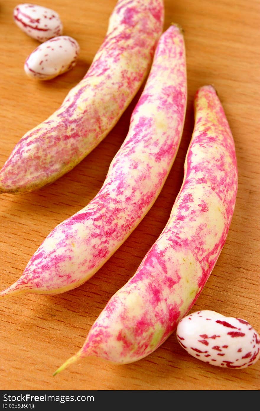 Beans on wooden table