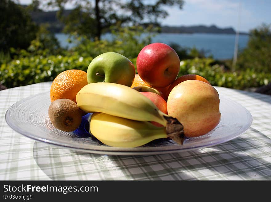 Fruits on a table outside in my garden.