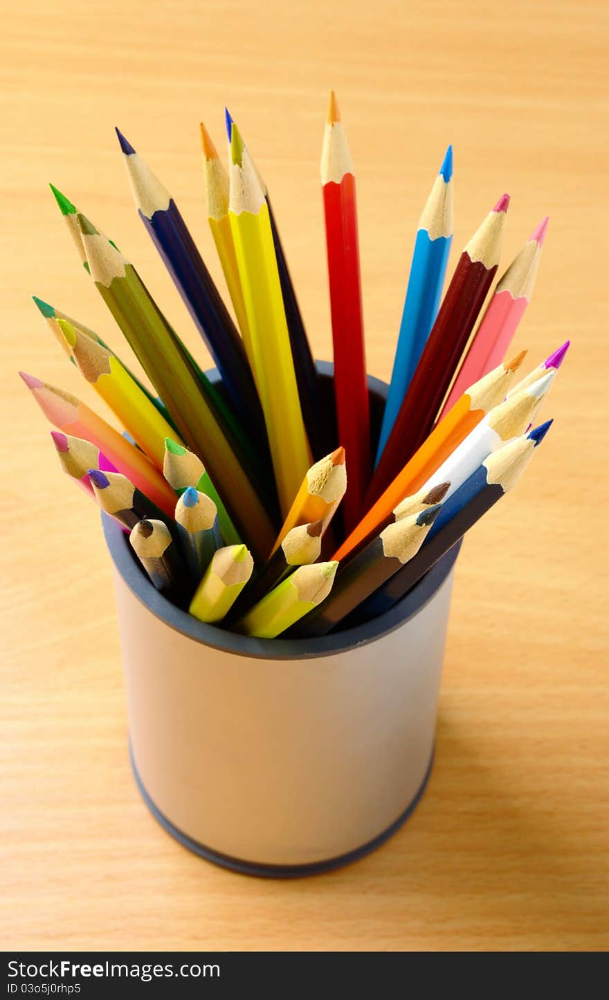 Pencils in plastic cup