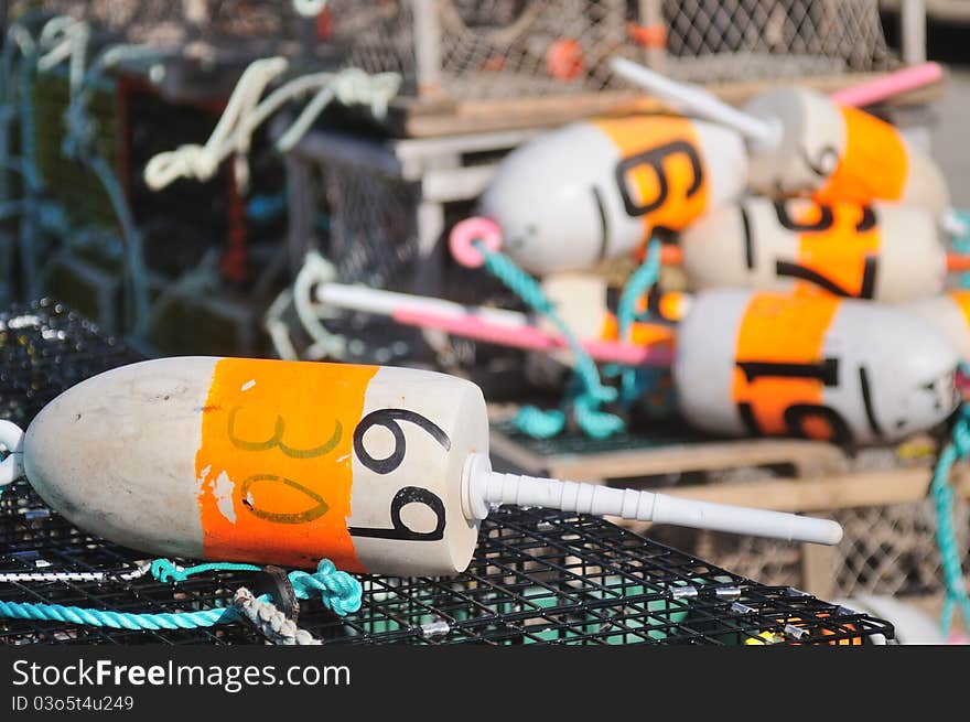 Buoys and ropes standing on libster trap cages. Buoys and ropes standing on libster trap cages