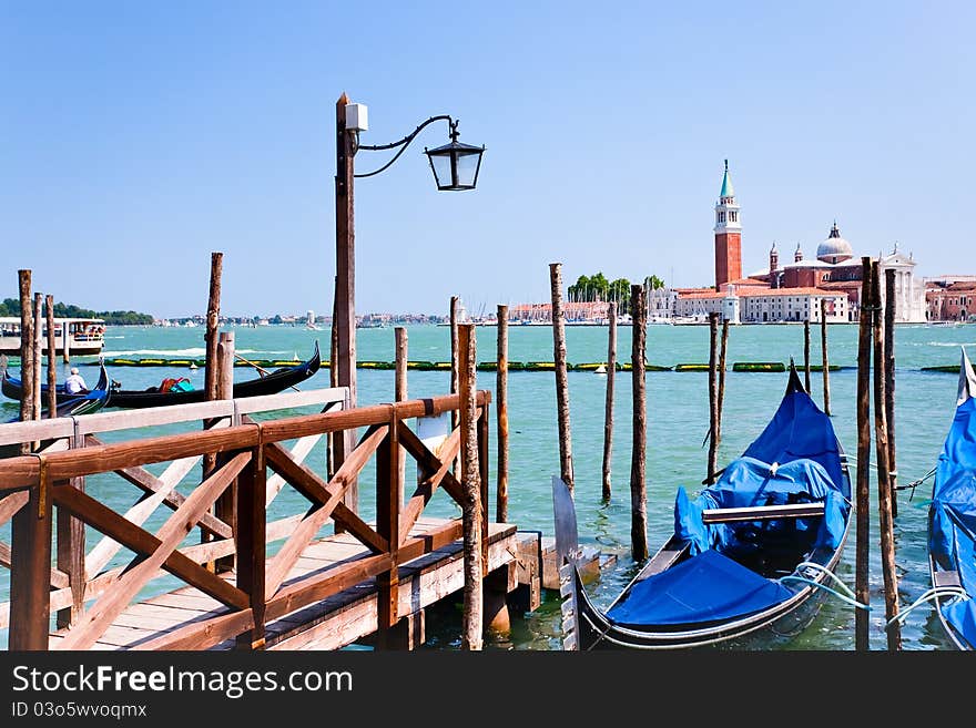 Pier on San Marco Canal and view on San Giorgio Maggiore, Venice, Italy. Pier on San Marco Canal and view on San Giorgio Maggiore, Venice, Italy