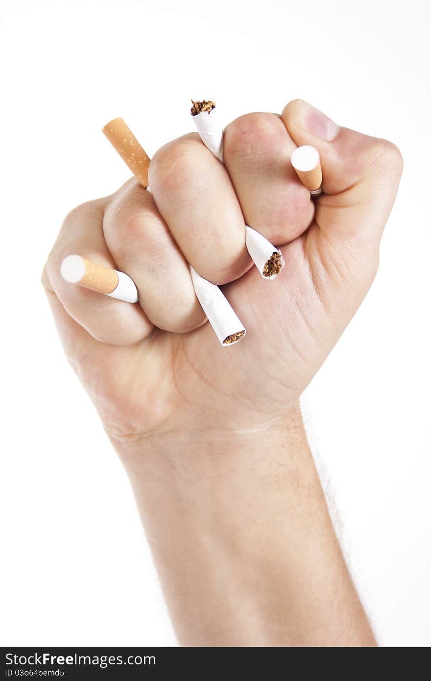 Man s hand crushing cigarettes