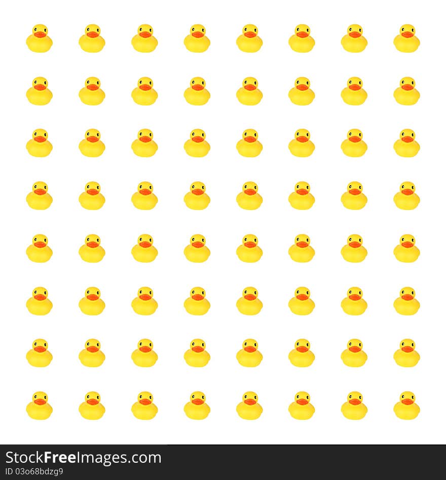 Yellow toy ducks in row background against white. Yellow toy ducks in row background against white