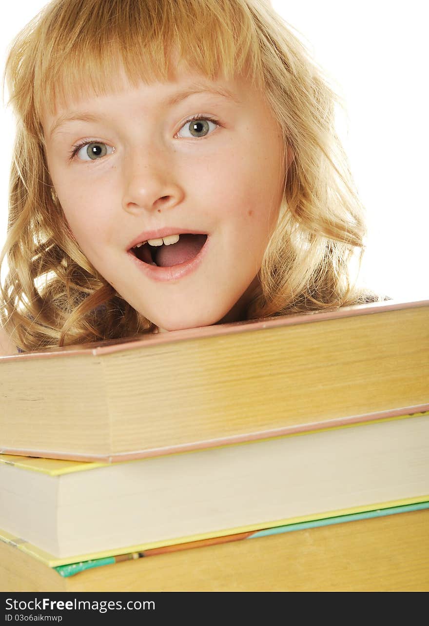 Surprised girl with big books, isolated on white. Surprised girl with big books, isolated on white