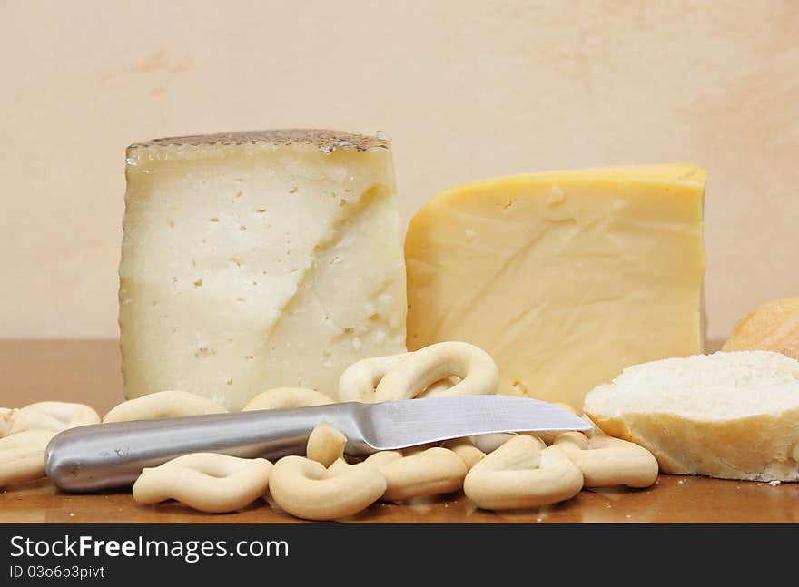 Still life with several types of cheese and slices of bread. Still life with several types of cheese and slices of bread