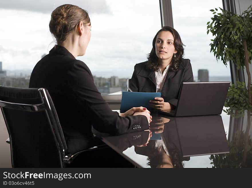 Latin businesswoman in office