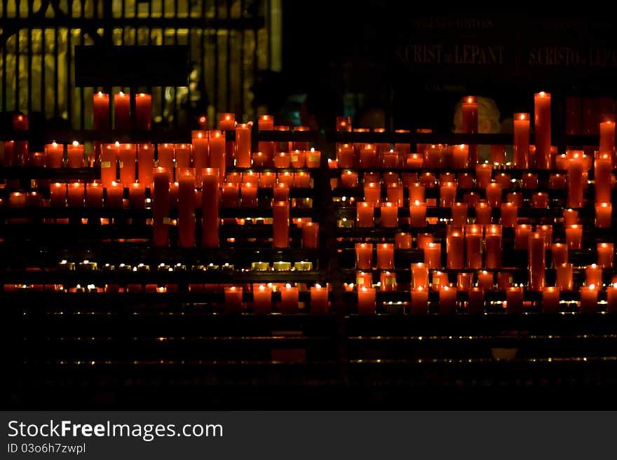 Red Candles in a European church. Red Candles in a European church